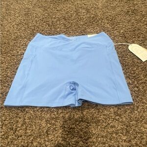Blogilates NWT crisscross scrunch shorts in cool blue size 1X
